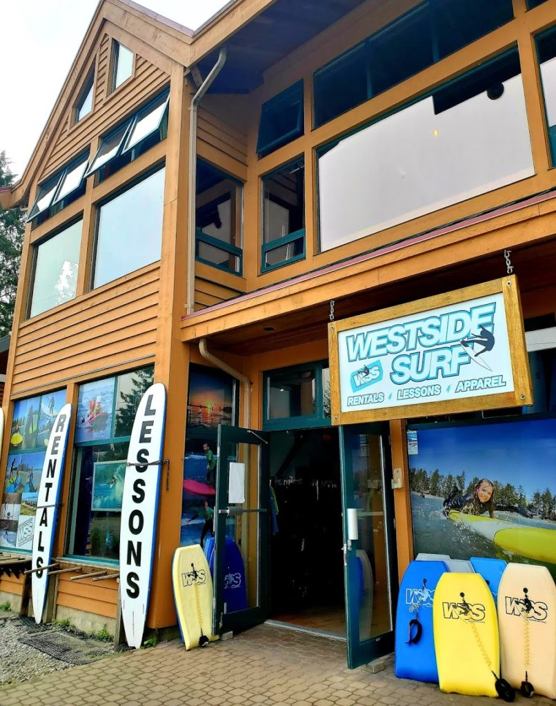 Storefront picture with surf boards of Westside Surf School, in Tofino Island.